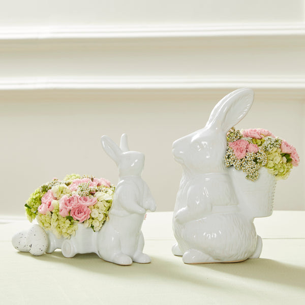 PETER E OLIVIA RABBIT COM FLORES COR DE ROSA