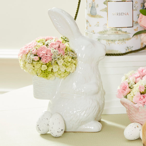 OLIVIA RABBIT COM FLORES COR DE ROSA