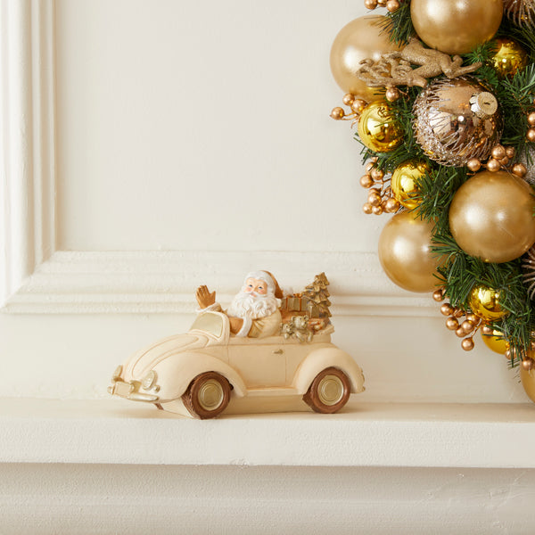 PAPAI NOEL NO CARRO DOURADO